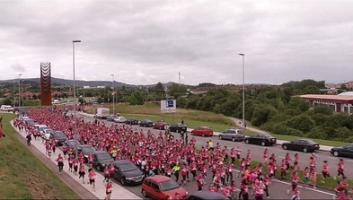 Carrera de la Mujer contra el cáncer por las calles de Gijón